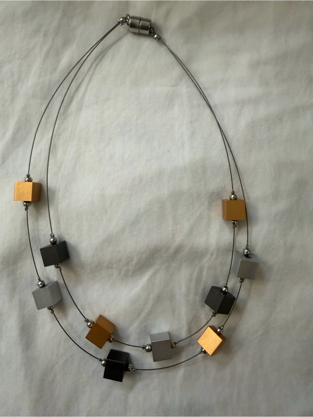 Modern Geometric Cube Necklace in Gold, Silver, and Black
